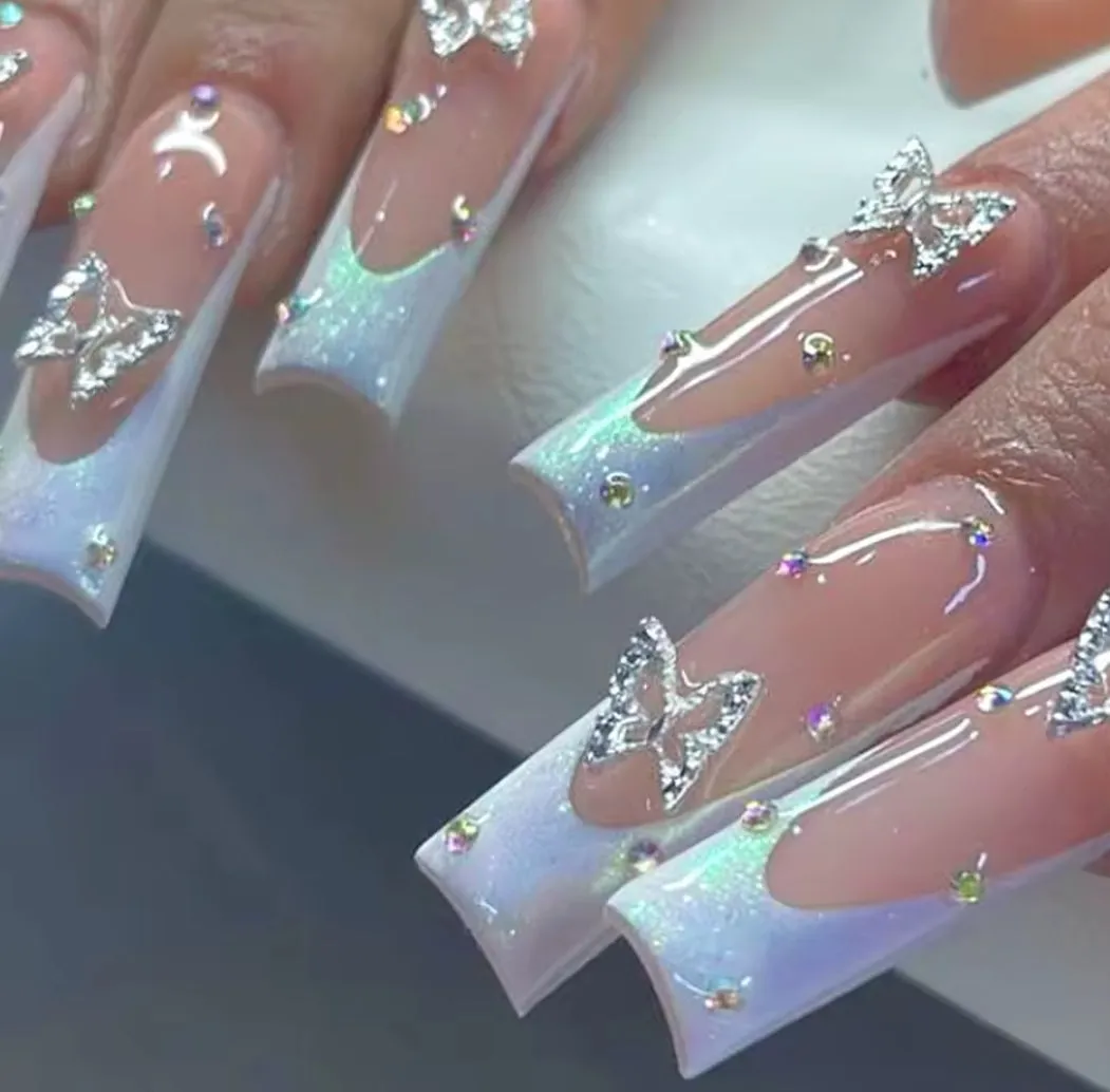 Flirty white butterfly nails