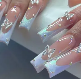 Flirty white butterfly nails